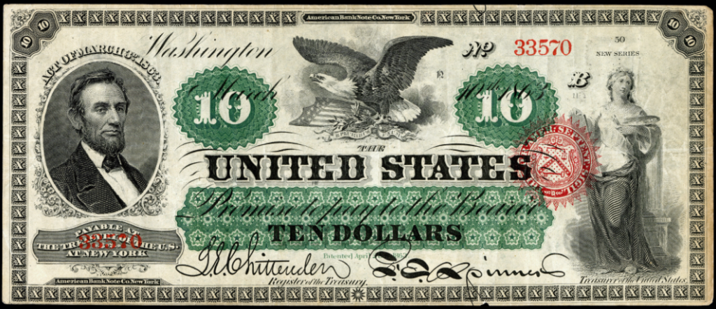 A photo of an early ten-dollar note, including a likeness of Abraham Lincoln.